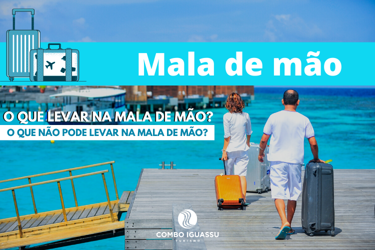 O que levar na mala de viagem? | Casal viajando com malas até um desk.